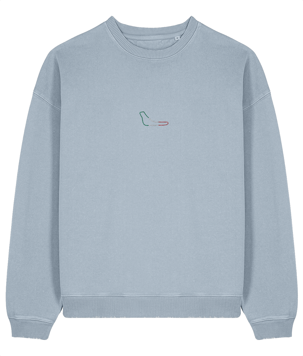 Celebrate Formula 1 heritage with this oversized organic cotton sweatshirt featuring a minimalist embroidered Monza circuit outline. Crafted for motorsport enthusiasts who value quality and timeless design.

Premium Quality &amp; Craftsmanship Made from 100% certified organic cotton (380 gsm), this offers superior comfort and style with oversized fit. The precise embroidery delivers exceptional durability that outlasts typical printed alternatives.