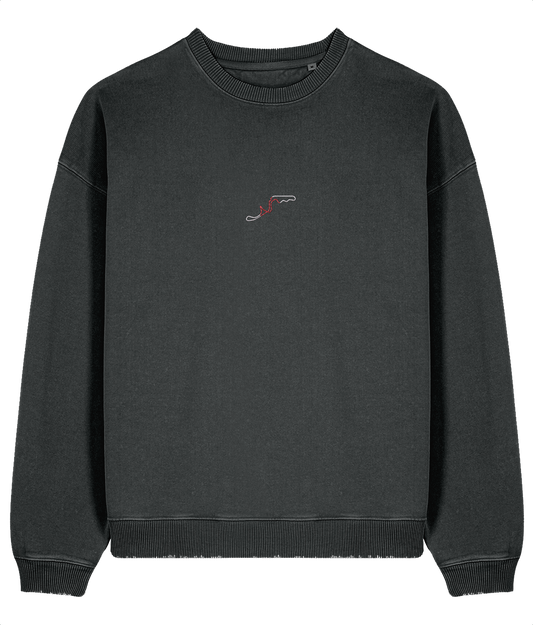 Celebrate Formula 1 heritage with this oversized organic cotton sweatshirt featuring a minimalist embroidered Suzuka circuit outline. Crafted for motorsport enthusiasts who value quality and timeless design.

Premium Quality &amp; Craftsmanship Made from 100% certified organic cotton (380 gsm), this offers superior comfort and style with oversized fit. The precise embroidery delivers exceptional durability that outlasts typical printed alternatives.